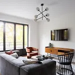 Sunlit Parisian With Balcony And Open Views