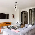 Sunlit Parisian With Balcony And Open Views