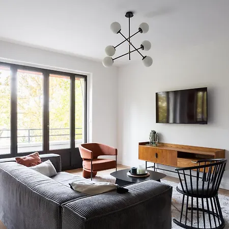Sunlit Parisian With Balcony And Open Views