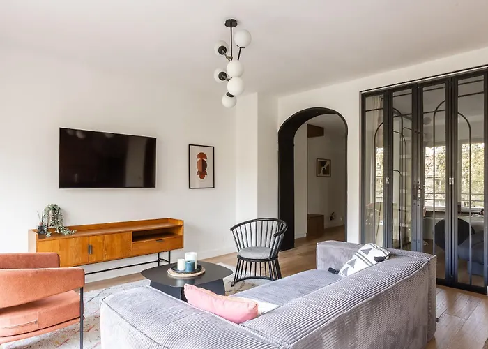 Sunlit Parisian With Balcony And Open Views