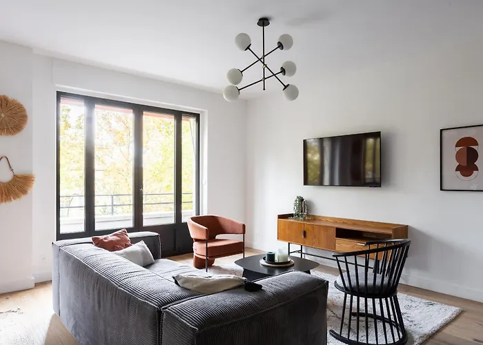 Sunlit Parisian With Balcony And Open Views